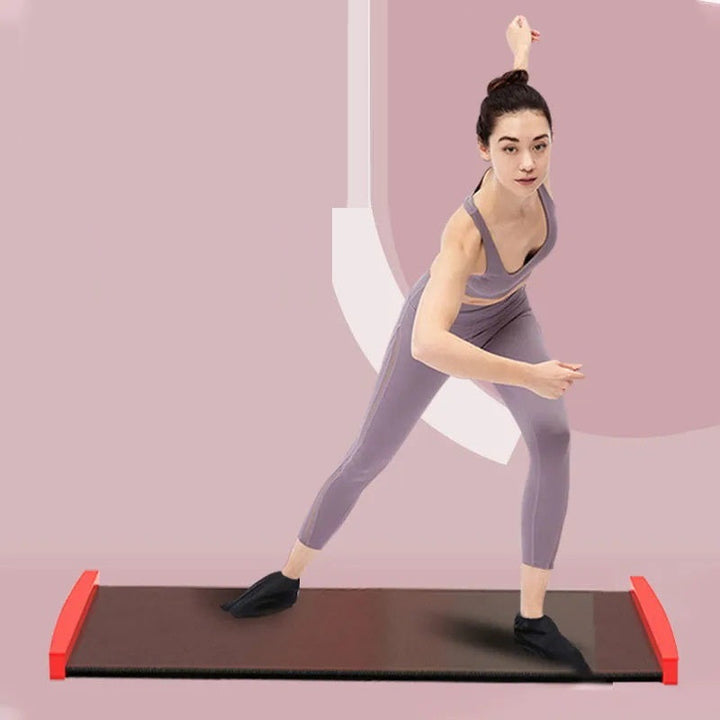 Planche de glisse Nova noire/orange, entraînement équilibre et renforcement musculaire. Parfait pour sport à domicile.