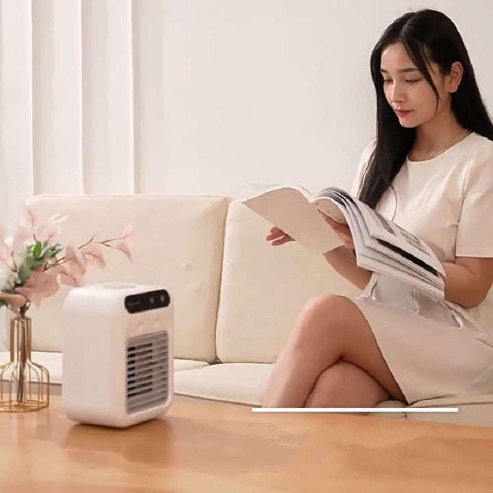 Refroidisseur d'air évaporatif personnel, silencieux, compact. Parfait pour bureau ou chevet. Fraîcheur instantanée.