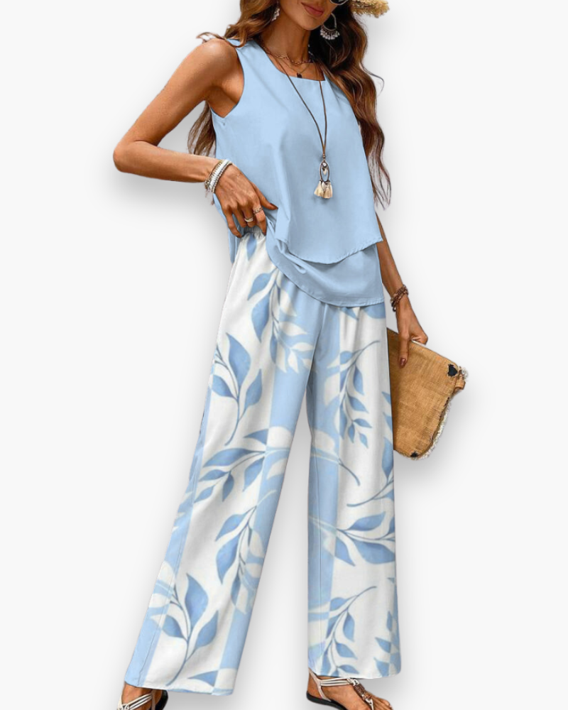Tenue d'été fluide femme, élégante et décontractée. Pantalon et haut sans manches pour un confort estival.