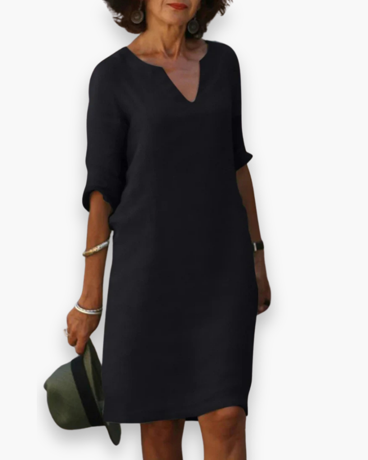 Robe femme polyvalente avec col V, manches 3/4, idéale pour un look élégant au quotidien.