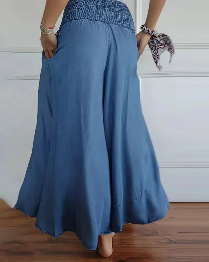 Pantalon jupe-culotte fluide taille haute, ample et décontracté, parfait pour un look polyvalent.