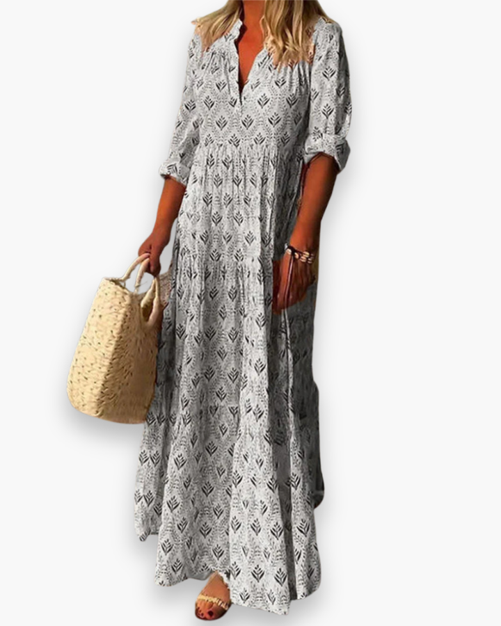Superbe robe longue bohème chic, parfaite pour femme en été. Look élégant et décontracté, idéal pour les vacances.
