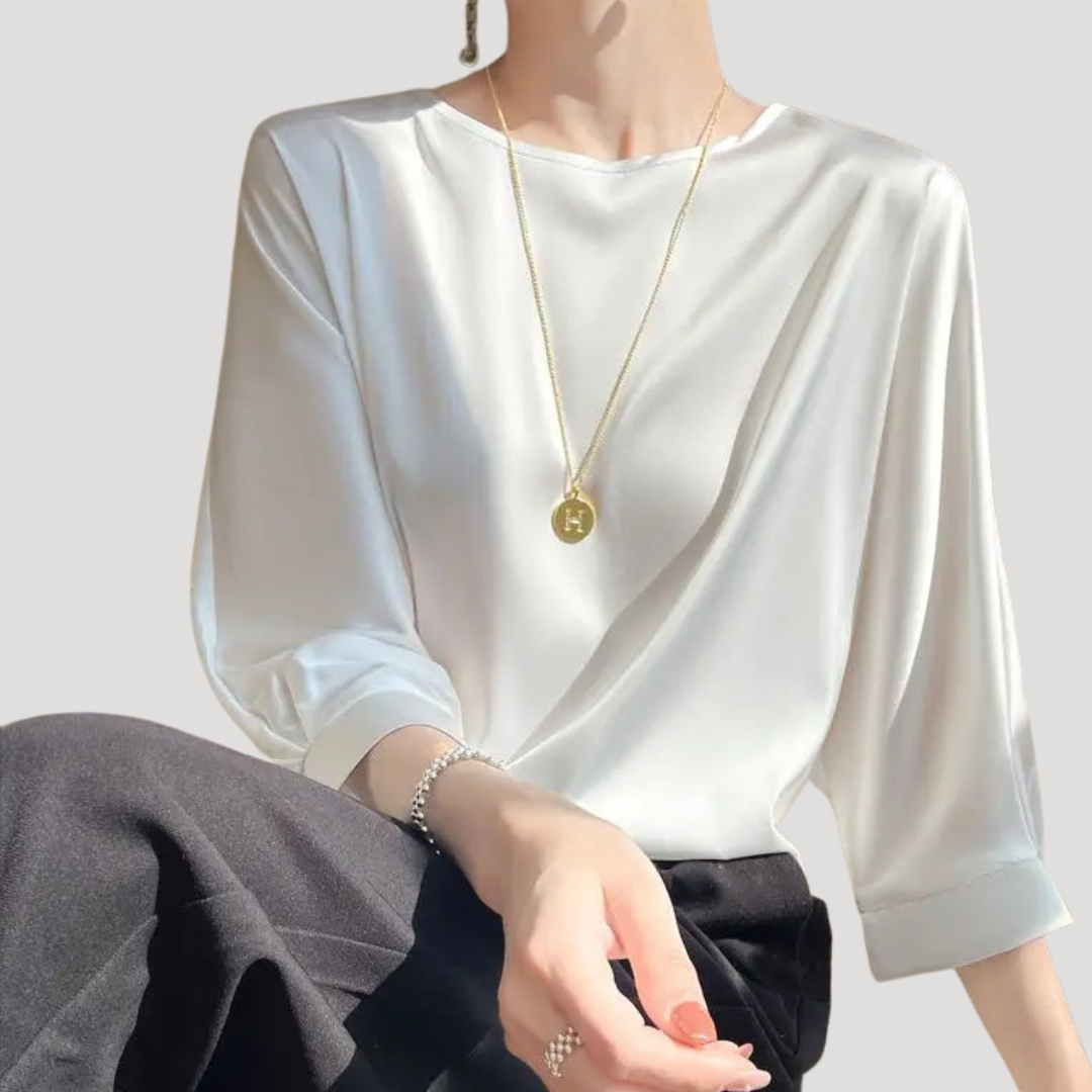Top femme polyvalent, manches 3/4, col rond. Idéal pour printemps, été, automne. Vêtement féminin mode.