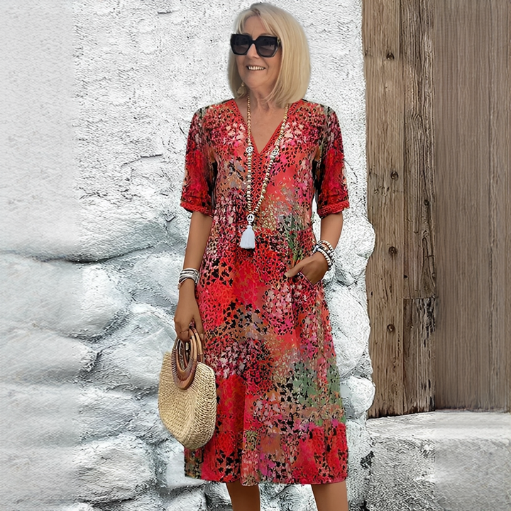Robe d'été femme, motif floral éclatant. Légère, confortable et parfaite pour une mode estivale élégante et décontractée.