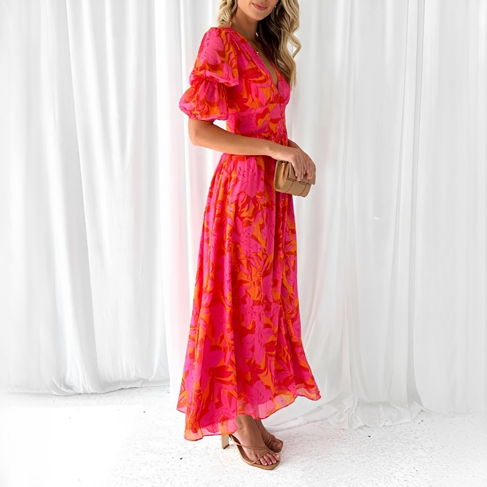 Sublime robe longue femme rose avec col V et manches bouffantes. Idéale pour événements spéciaux et mode chic.