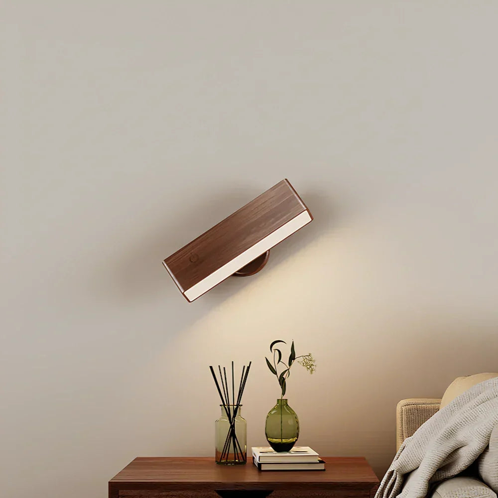 Applique LED magnétique au design moderne, crée une ambiance chaleureuse avec sa lumière dimmable.