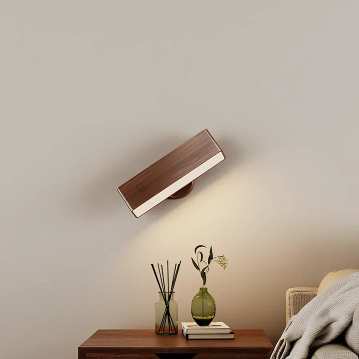 Applique LED magnétique au design moderne, crée une ambiance chaleureuse avec sa lumière dimmable.