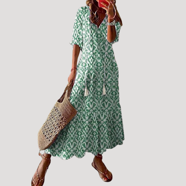 Robe longue femme fluide avec motif bohème, élégante et légère, parfaite pour les journées chaudes d'été.