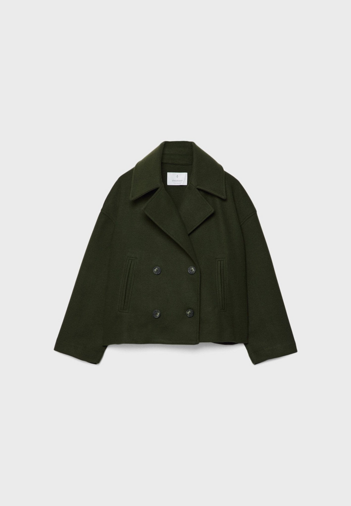 Veste de tailleur courte femme, chic et moderne, pour toute occasion habillée.