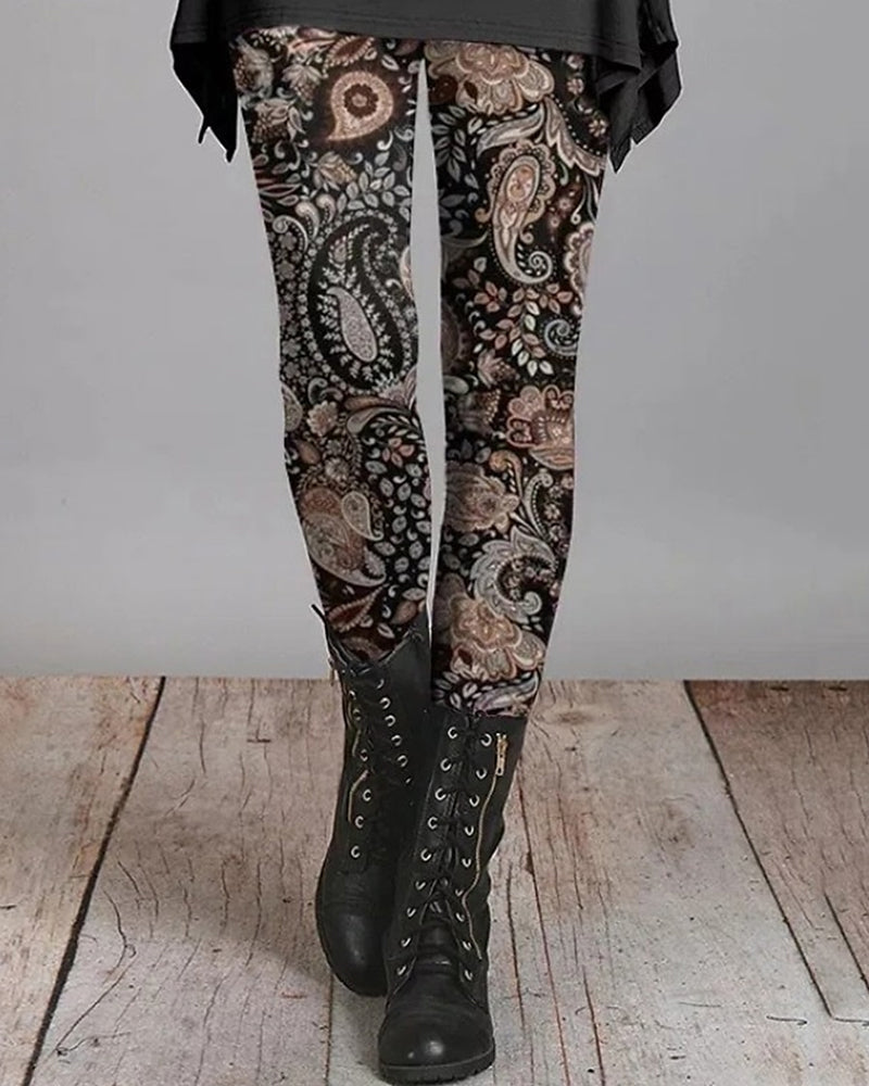 Leggings femme taille haute bohème rétro. Motifs ethniques colorés, idéaux pour festival et mode décontractée confortable.