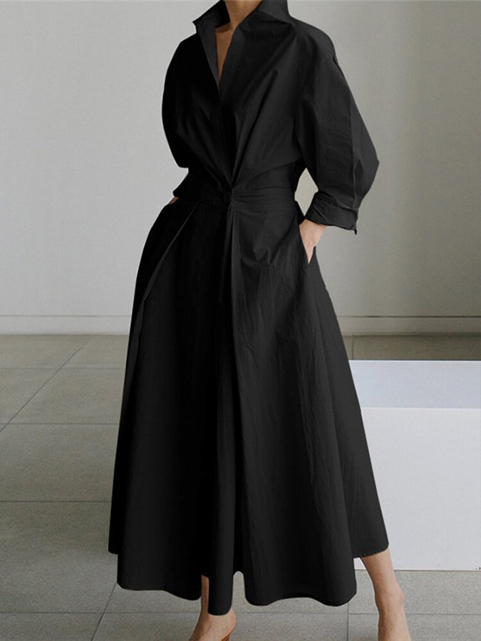 Robe midi boutonnée verte, look frais et printanier. Parfaite pour l'été, une pièce élégante et polyvalente.