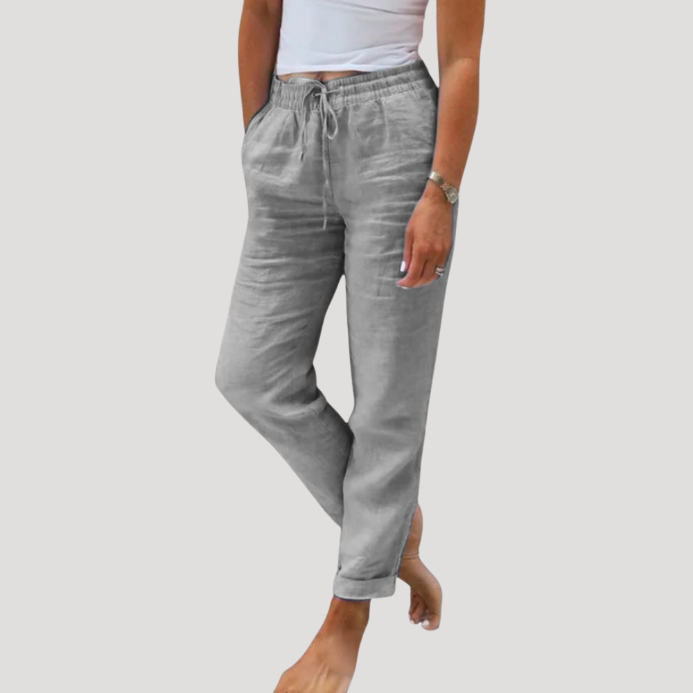 Détail du pantalon fluide femme : taille élastique confortable et tissu doux, parfait pour une silhouette élégante.