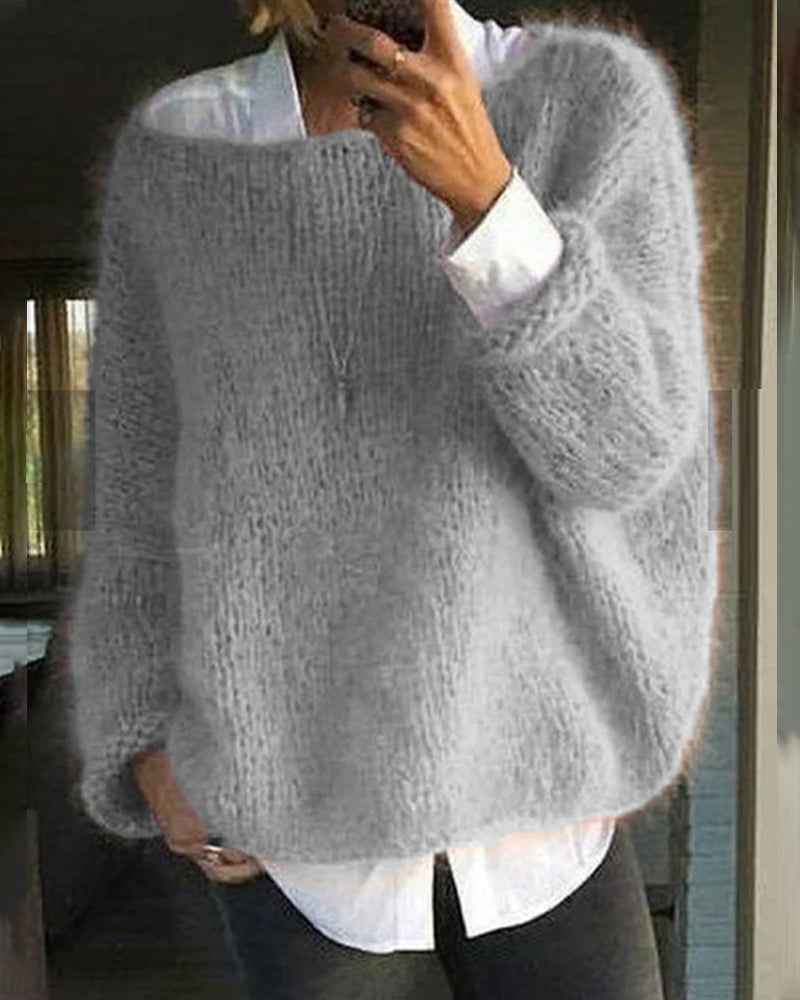 Chandail femme confortable et intemporel, coupe élégante. Pull d'hiver polyvalent à col rond pour mode féminine.