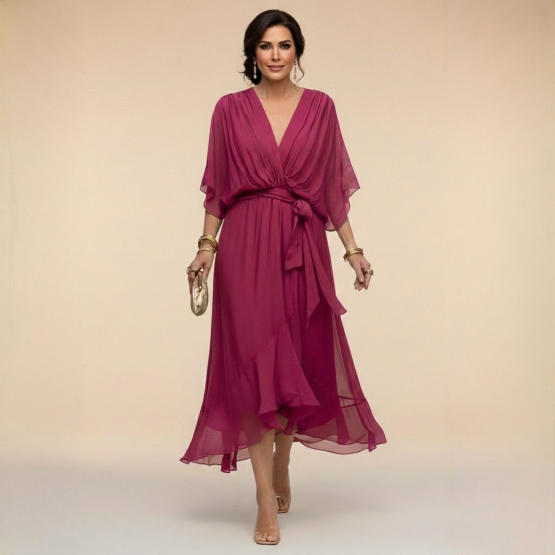 Élégante robe femme fluide en chiffon, col V, ceinturée. Confortable et chic pour le printemps-été.