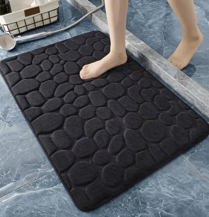 Solution complète: tapis de bain absorbant, antidérapant, séchage rapide pour hygiène et sécurité optimales.