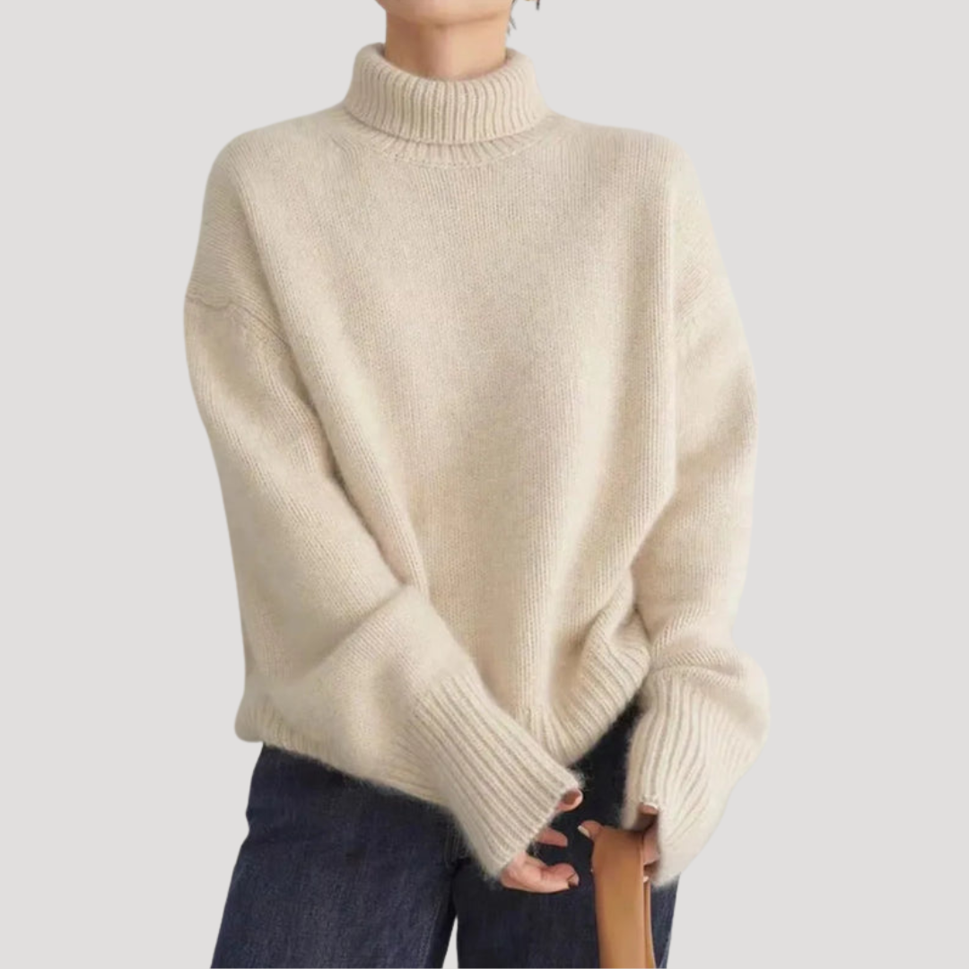 Pull femme chaud et moelleux, coupe oversize, col roulé, pour un style décontracté et élégant cet hiver.