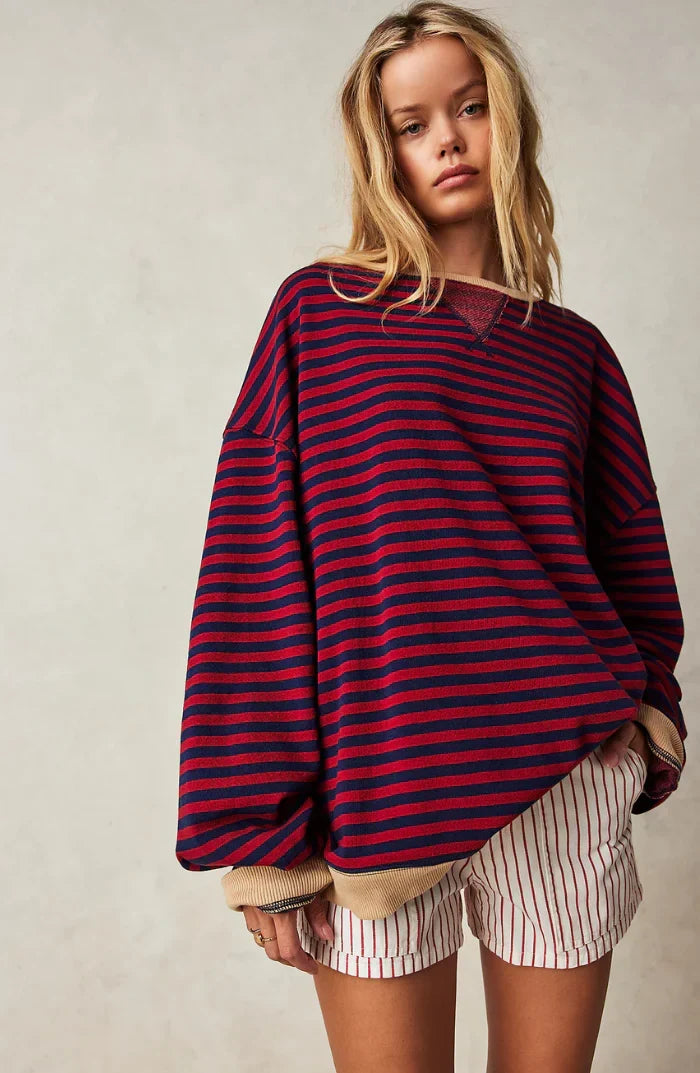 Vêtement femme: sweat rayé oversize, style moderne et confortable pour le printemps.