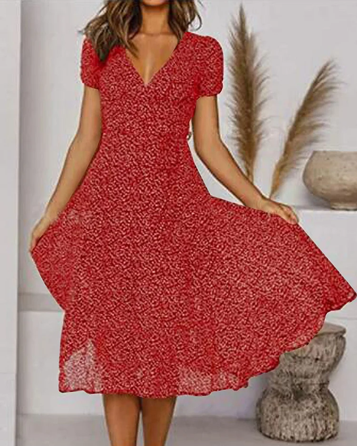 Élégante robe midi florale pour femme, col V, parfaite pour le printemps-été, style chic décontracté.
