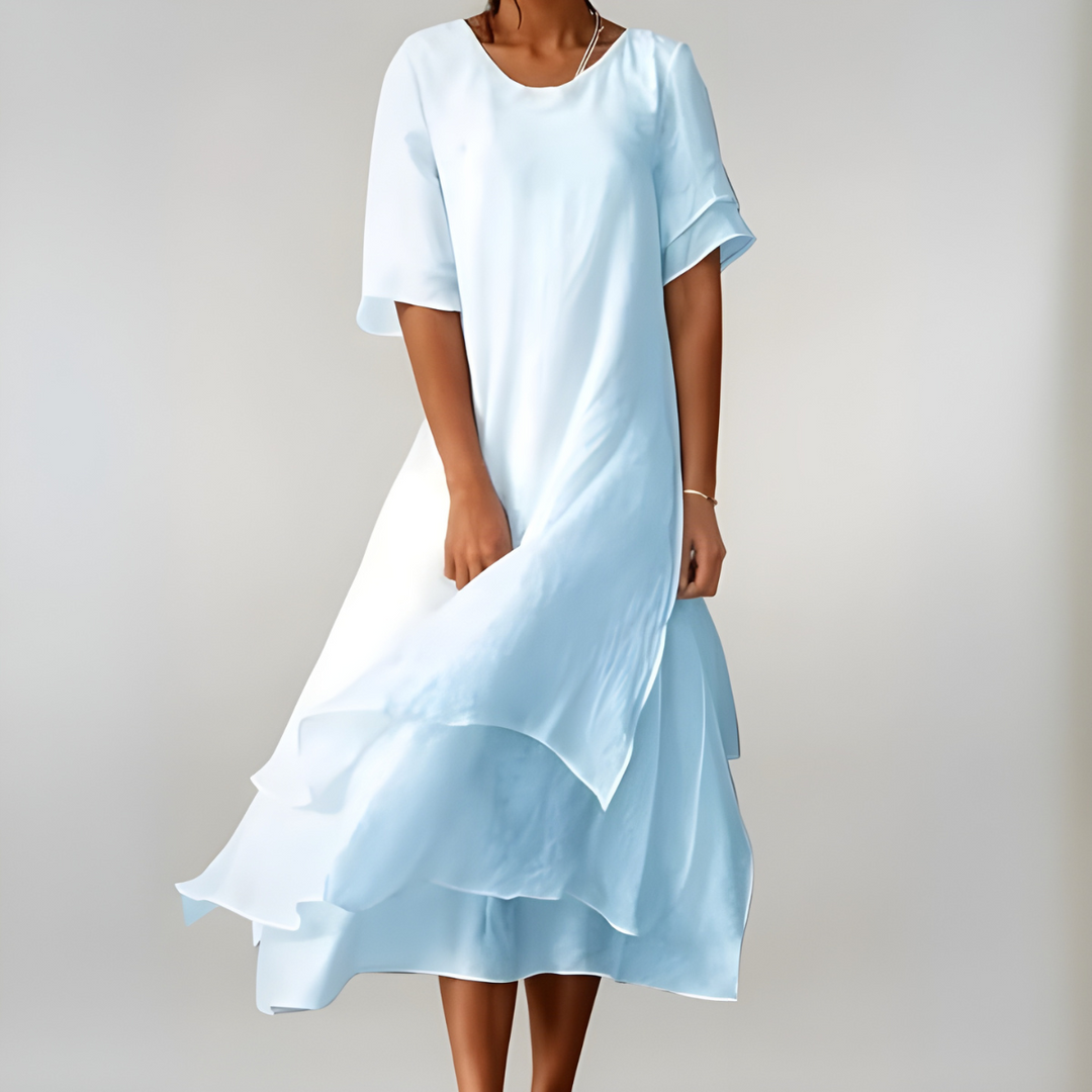 Robe longue femme, coupe fluide, grandes tailles disponibles. Tenue estivale élégante et confortable en mode femme.