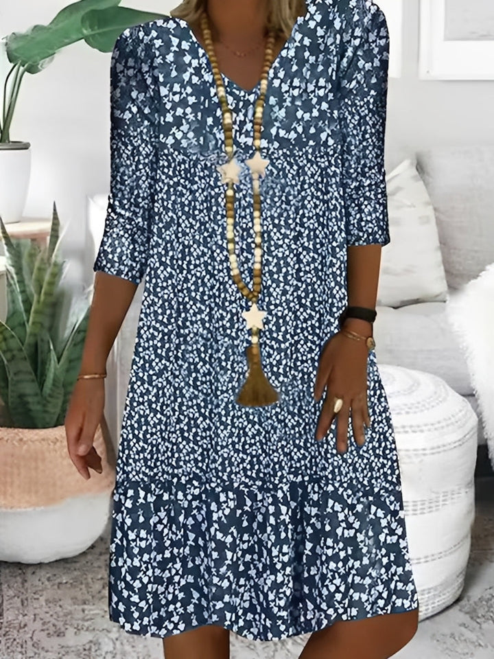 Robe femme décontractée col V fluide, élégante et confortable pour l'été. Mini robe chic pour le quotidien.