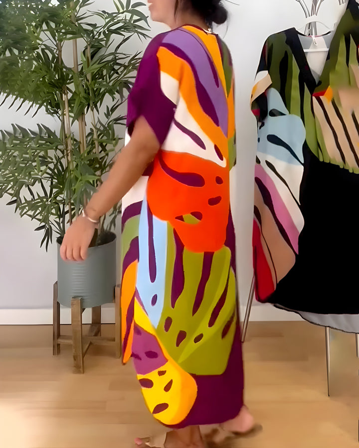 Robe printemps-été fluide, coupe ample décontractée, motifs feuillage. Col V, ultra-confortable et tendance.