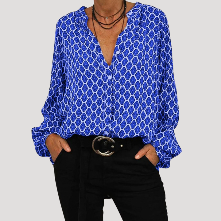Chemisier chic femme à motifs, col V, manches longues. Parfait pour la mode printanière ou automnale décontractée.