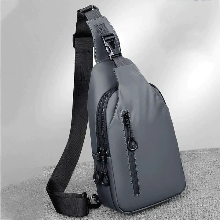 Sac bandoulière urbain moderne anti-vol, imperméable, protection optimale pour vos effets personnels.