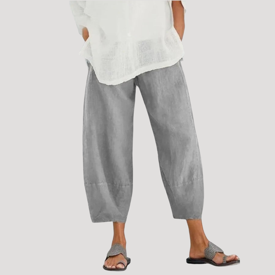Pantalon décontracté en lin pour femme, coupe large et confortable. Idéal pour l'été et la mode féminine estivale.