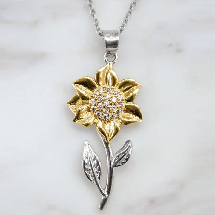 Bijoux femme : collier tournesol doré brillant, symbole de joie et élégance. Un cadeau parfait.