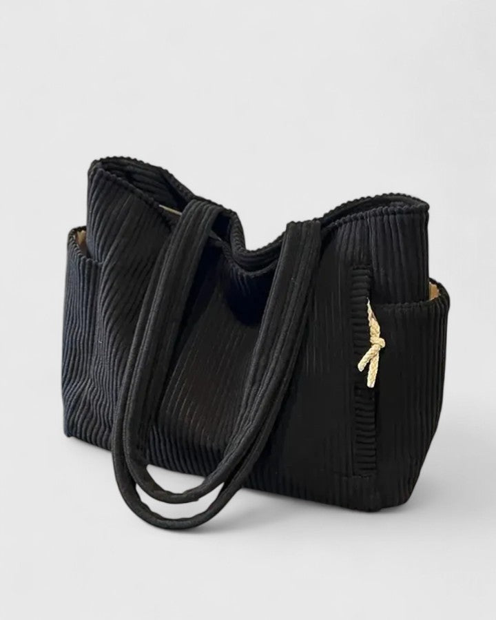 Fourre-tout Angelique pour femme. Ce sac cabas pratique et spacieux est parfait pour le quotidien.