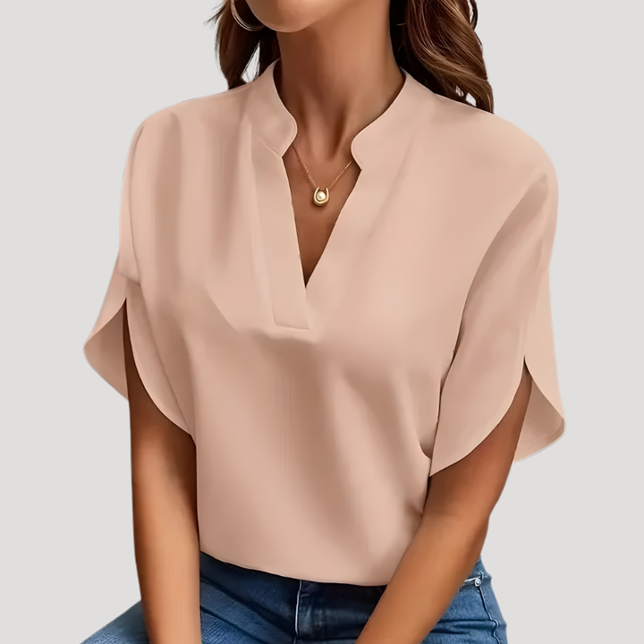 Blouse femme polyvalente col V, coupe fluide et confortable, mode printemps/été.