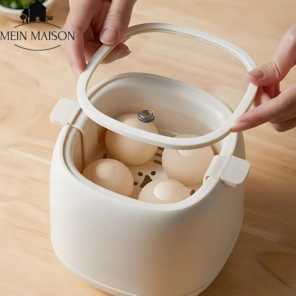 Appareil de cuisson œufs électrique compact. Cuit 4 œufs automatiquement, accessoire pratique pour la cuisine moderne.