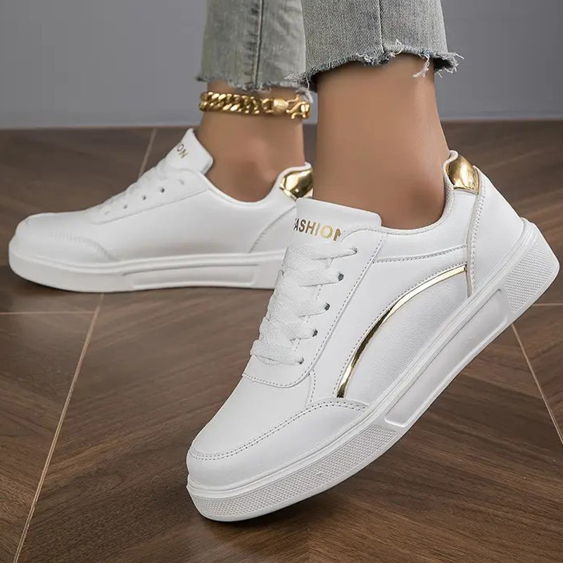Baskets blanches confortables pour femme, parfaites pour le quotidien, alliant élégance et bien-être.