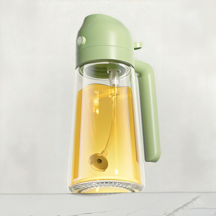 Vaporisateur OilLux compact en verre résistant, parfait pour graisser plats et salades.