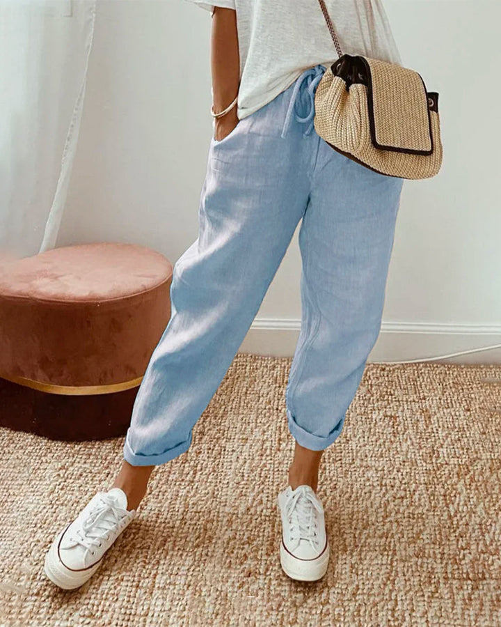 Pantalon femme en lin décontracté élégant, taille ajustable pour un confort chic au printemps/été.