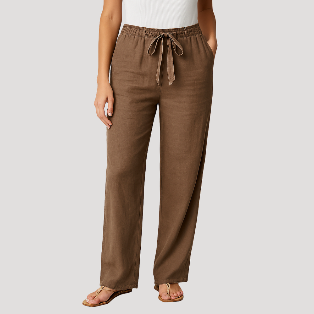 Pantalon lin femme respirant, taille élastique pour un confort optimal. Style casual et ample, parfait pour l'été.