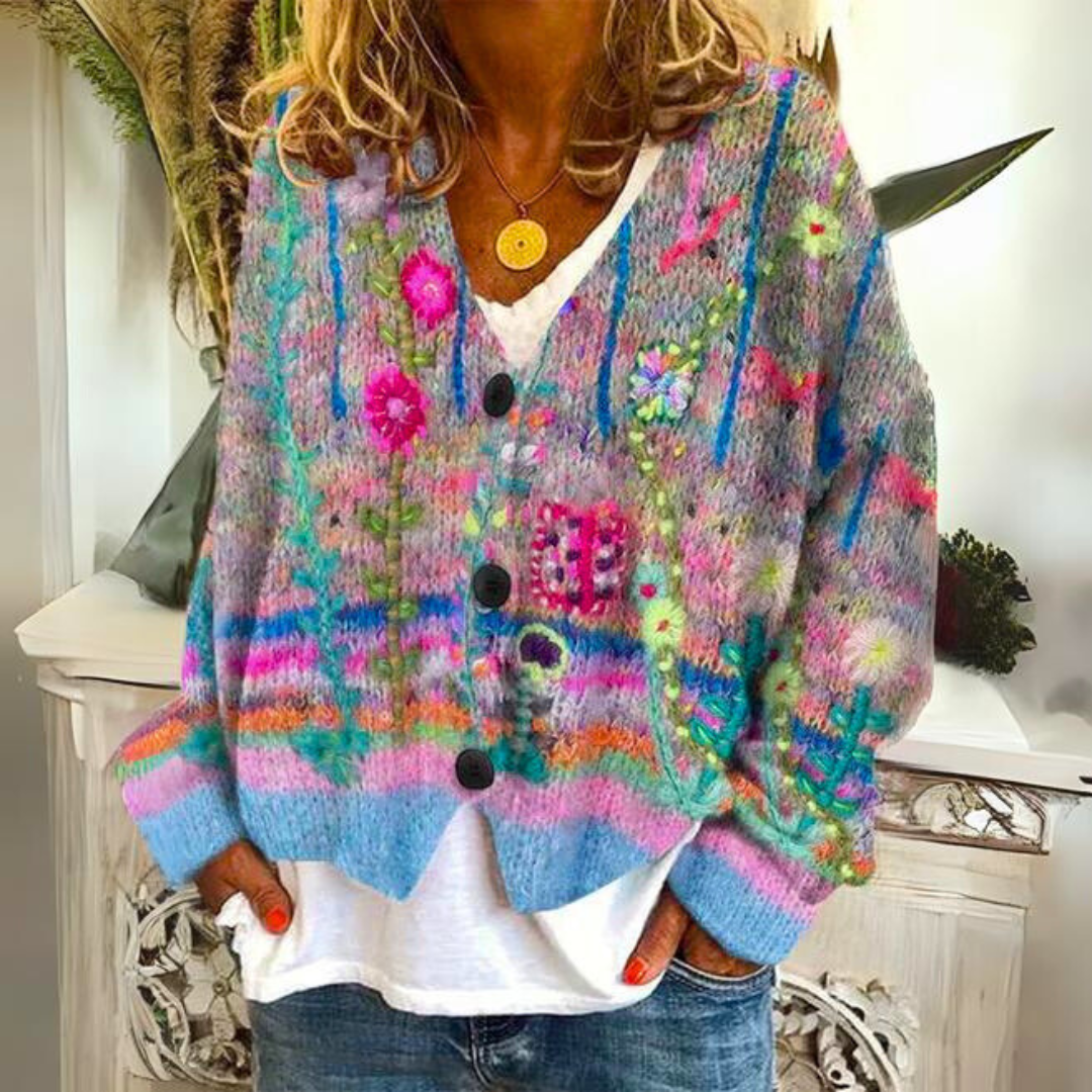 Cardigan bohème multicolore pour femme avec broderies florales détaillées en tricot ample et confortable.
