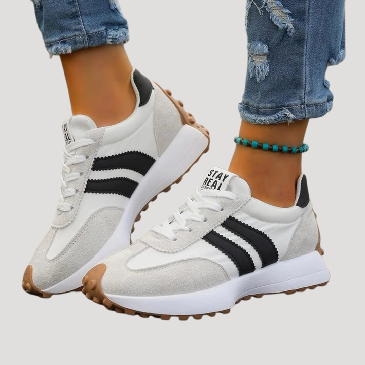 Sneakers femme rétro vives, légères et confortables. Parfaites pour un style sport chic ou décontracté.