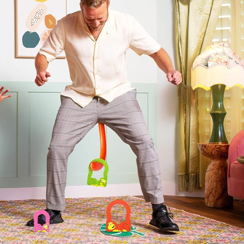 Enfants et adultes participent joyeusement à une partie dynamique de Swingo Actif. Jeu de fête stimulant.