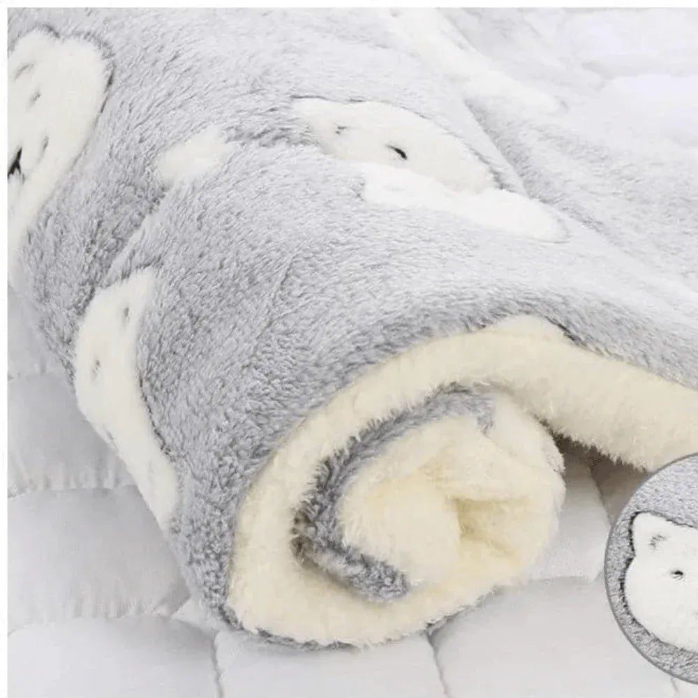 Accessoire de confort pour animaux. Tapis douillet effet nuage, lit moelleux pour chien et chat.