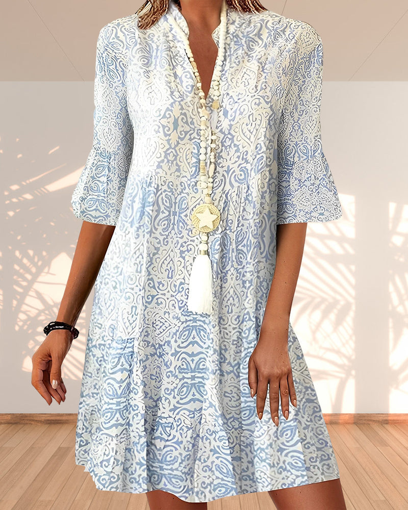 Robe élégante femme à manches courtes imprimées. Idéale printemps/été, style décontracté chic pour femmes.