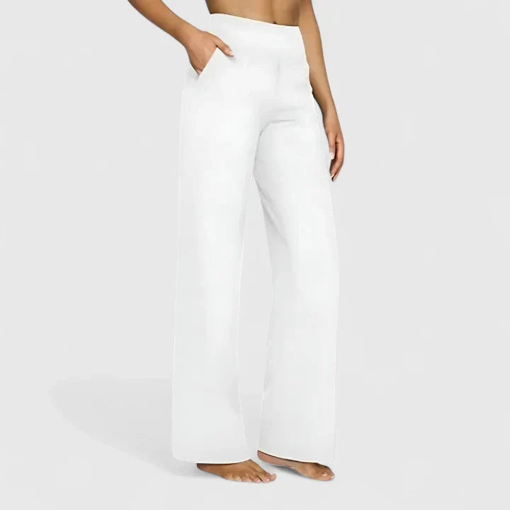 Pantalon élégant femme, taille haute, jambe droite, idéal pour le bureau ou une sortie stylée.