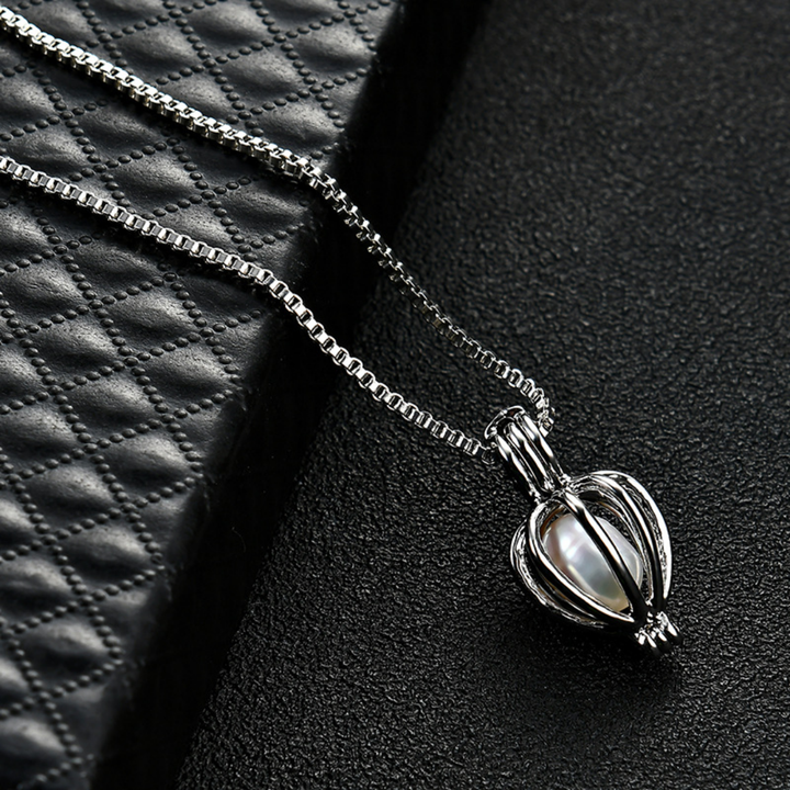 Ensemble cadeau pendentif perle unique, un bijou élégant et romantique pour surprendre une femme spéciale.