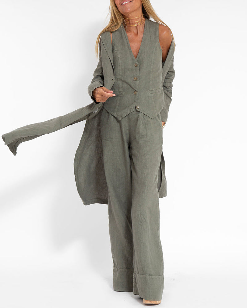 Ensemble fluide en lin pour femme, gilet et pantalon ample chic pour l'été.