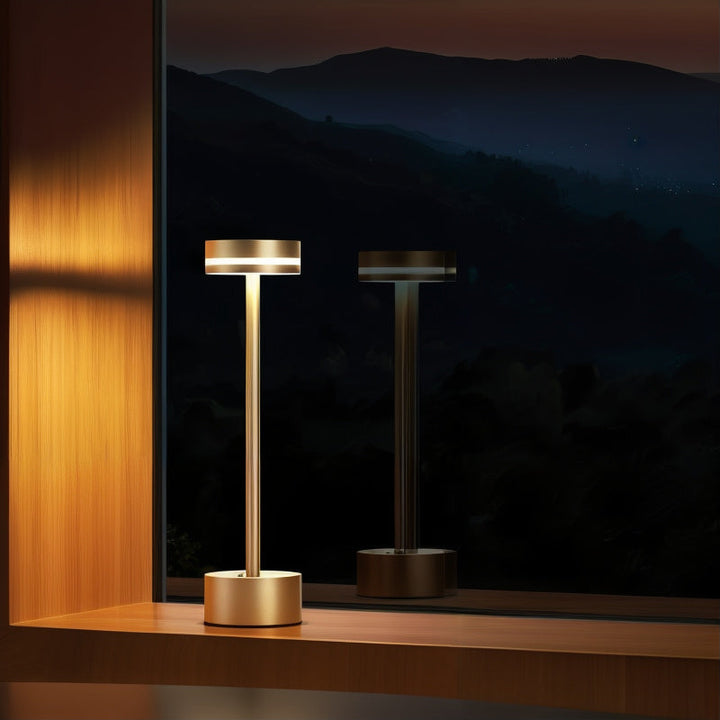 Lampe de table LED sans fil pour ambiance cosmique, design moderne en aluminium, lumière dimmable pour intérieur.