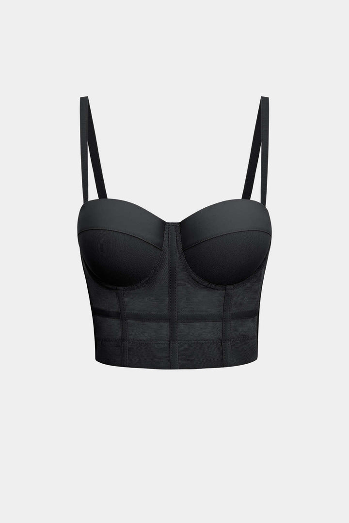 Bustier femme transparent et ajusté, doté d'armatures pour un maintien élégant.