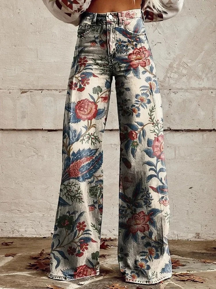Pantalon large taille haute Luna femme à imprimé floral. Style élégant et fluide, parfait pour le printemps et l'été.