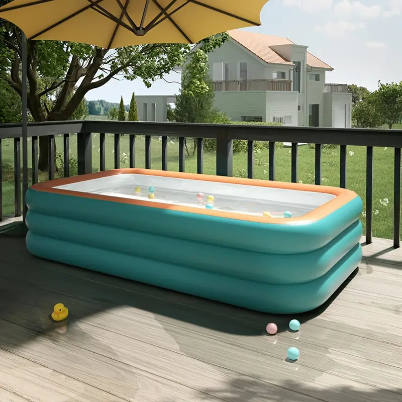 Grande piscine gonflable pour rafraîchissement estival en famille dans le jardin; facile à monter.