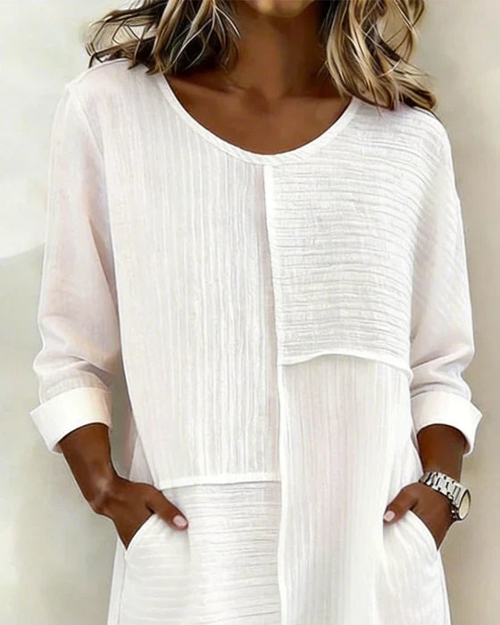Robe femme décontractée chic en coton lin texturé, col rond, manches 3/4. Confortable et élégante pour le quotidien.