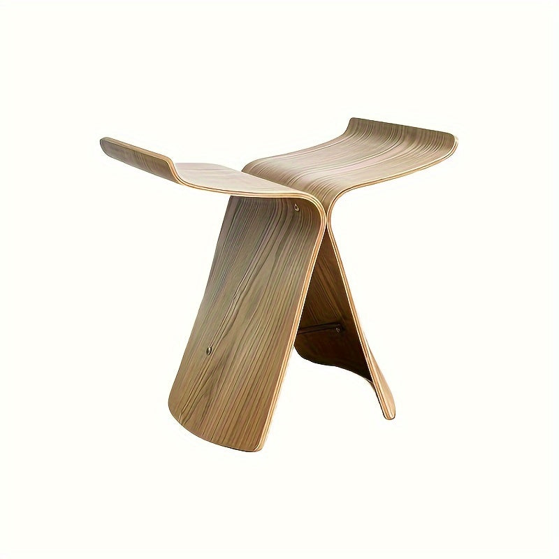 Tabouret Papillon en bois massif noyer, design intemporel pour salon élégant et moderne.